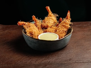 Креветки Катаїфі з соусом Васабі.