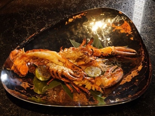 Лобстер на робаті в соусі