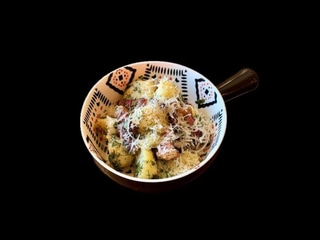 Картопля молода з беконом та пармезаном 