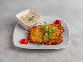 Placki ziemniaczane w sosie pieczarkowym 