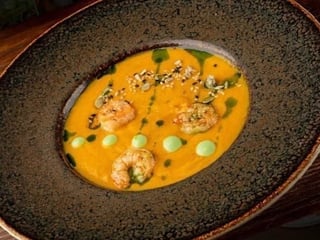 Pumpkin cream soup with shrimp