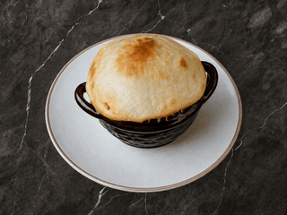 Lamb Stew in a Clay Pot under Pastry