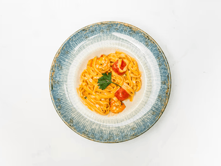 Tagliatelle with tiger shrimps  and bisque sauce
