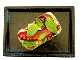 Bruschetta with octopus, tomatoes and Kalamata olives 