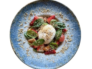 Italian burrata with tomatoes, strawberries and pesto sauce 
