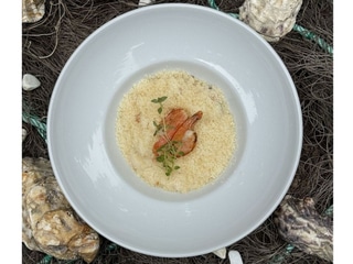 Risotto z owocami morza, kremem śmietankowym i serem Parmezan