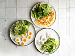 THREE EGGS PREPARED IN DIFFERENT STYLES