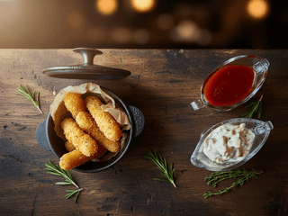 Сирні палички в паніровці