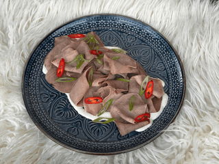 Язик з гострим соусом із хрону