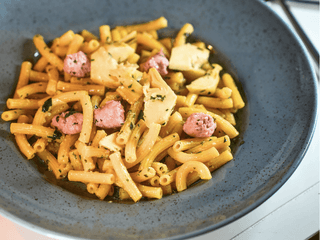 Sedanini gialli carciofi e salsiccia romagnola