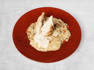 Petto di pollo con risotto alla Parmigiana