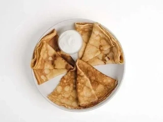 Crepes com creme azedo