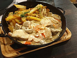 Куряче філе тушковане з грибами