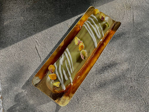 Еклер фісташка (100г)