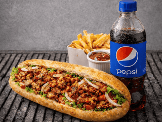 Kuřecí kebab v Bánh Mì bagetě připravený na lávových kamenech MENU