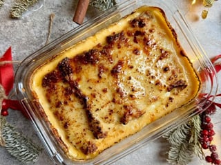 Млинці з рікотою та шпинатом під сирним соусом