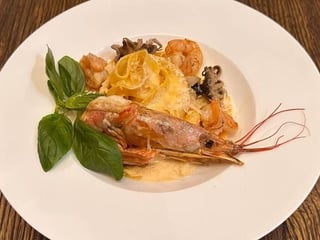 Фетучіні з лангустином та морепродуктиами у вершковому соусі