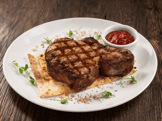 Стейк зі свинини на кісці - на грилі (вагова)