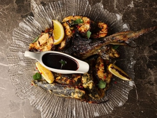 Осетер маринований  з гранатовим соусом