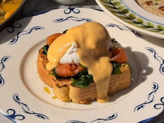 Eggs Benedict with hollandaise sauce and salmon