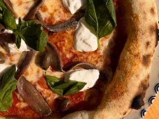 Pizza “Napoli” with anchovies and stracciatella