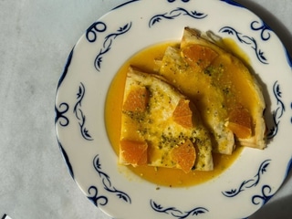 Crepes with orange and pistachios