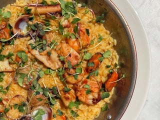 Orzo with seafood in bisque sauce