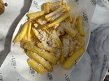 French fries with truffle oil and parmesan