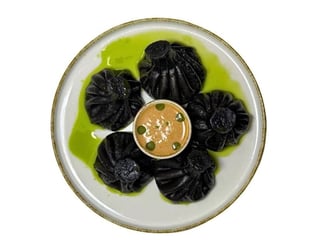 Хінкалі з креветками в соусі Том Ям