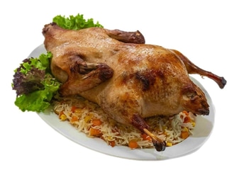 Качка, фарширована яблуками та копченими грушами