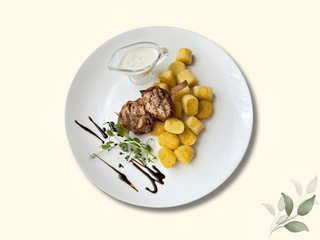 Медальйони зі свинини з картопляними  ньоками
