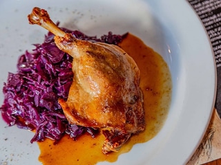 Confit duck leg with stewed red cabbage and slovak potato dumplings