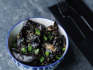 Гриби в часниковому соусі 