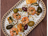 Морепродукти з зеленим соусом
