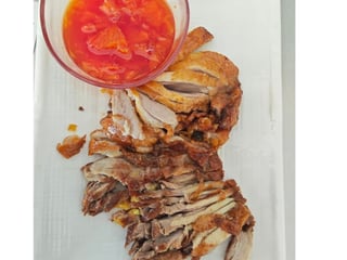 Pato con salsa naranja