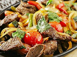Соковита свинина з овочами