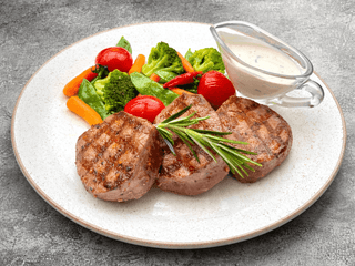 Телячі медальйони на грилі
