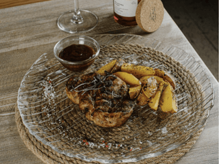 Стейк зі свинини з картоплею по-селянськи