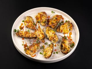 Мiдii запеченi в соусi