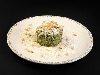 Шпинат тушкований з кедровим горiхом