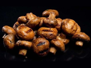 Печериці смажені на вогні