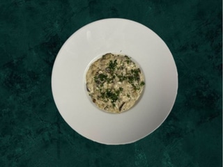 Карпатські тушковані білі гриби у вершковому соусі