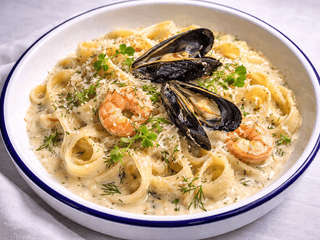 Паста з креветками в вершковому соусі