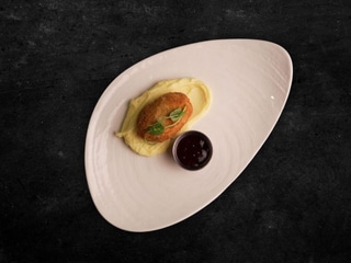 Breaded Chicken Cutlet with Brie and Dried Cranberries