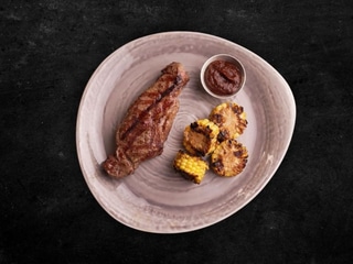 New York Steak. Serve with grilled corn