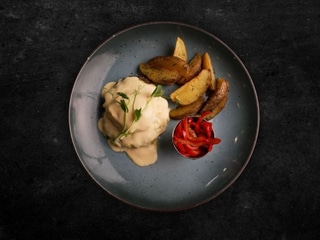 Beef Patty with Country-Style Potatoes and Hollandaise Sauce