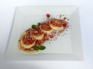 Syrnyky with custard and almond crumbs