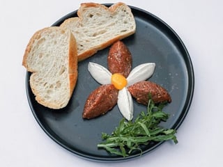 Beef steak tartare on a cream cheese