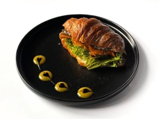Croissant with kebab, roasted pumpkin and caramelized onion