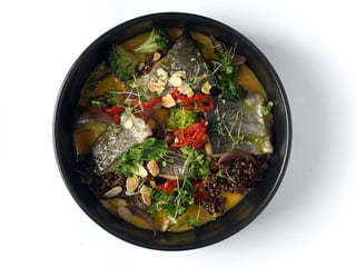 Trout fillet with pumpkin cream, quinoa and vegetables